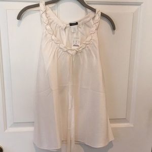 Never worn 100% silk cream camisole